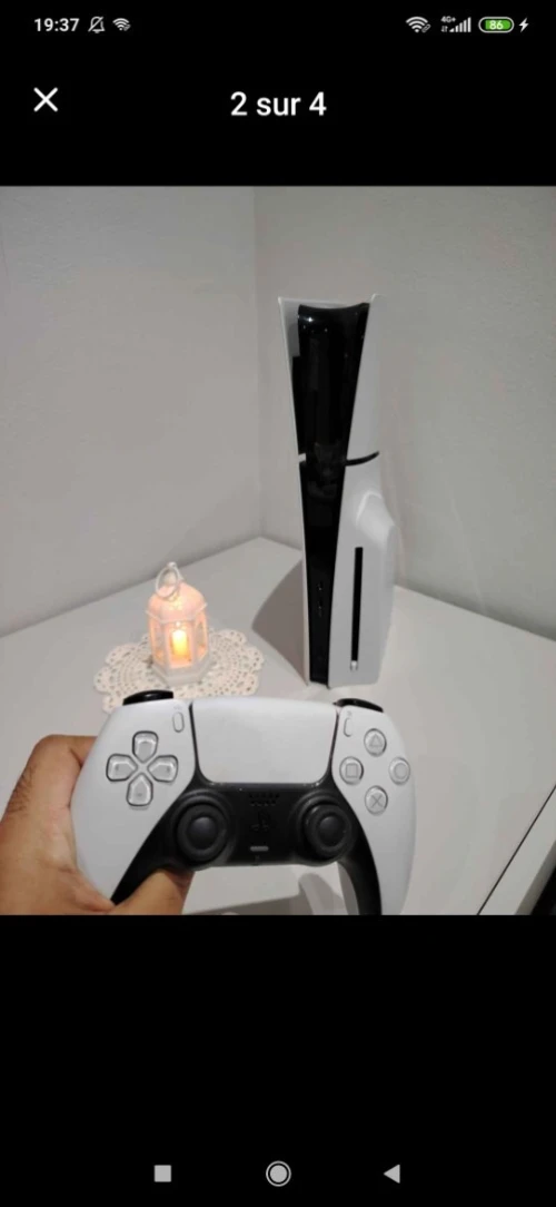 Ps5 slim standard avec manette original + des jeux degital