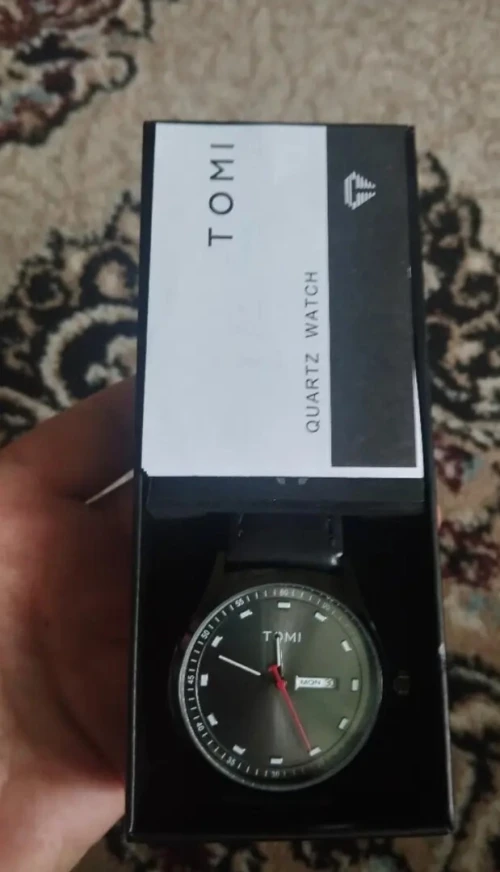 ساعة أصلية TOMI