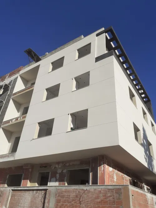 Revêtement façade enduit monocouche