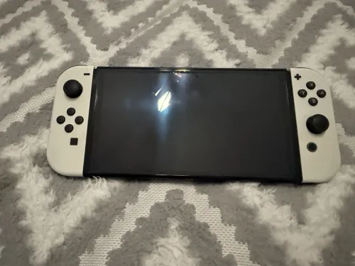 Nintendo Switch Oled + protection écran Non flashé