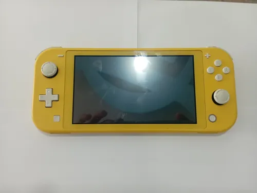 Nintendo Switch Lite flashé 64gb carte memoire