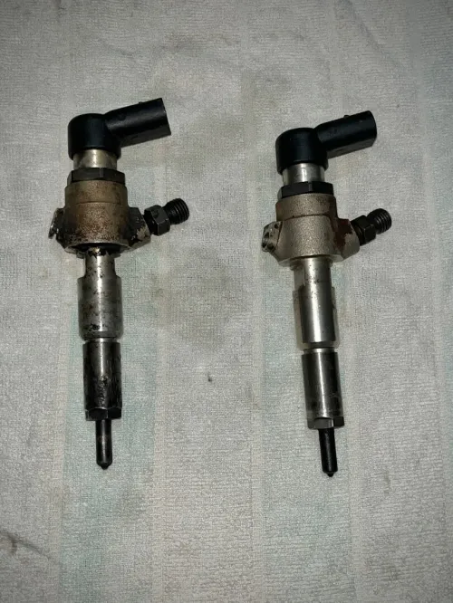 . Injecteur 1.4 tdci Ford 