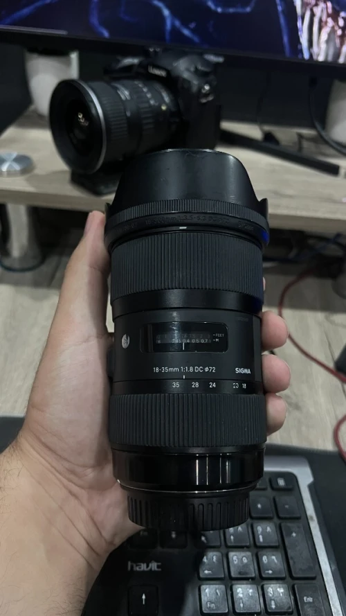 sigma 18-35mm 1.8 monture canon + pare soleil