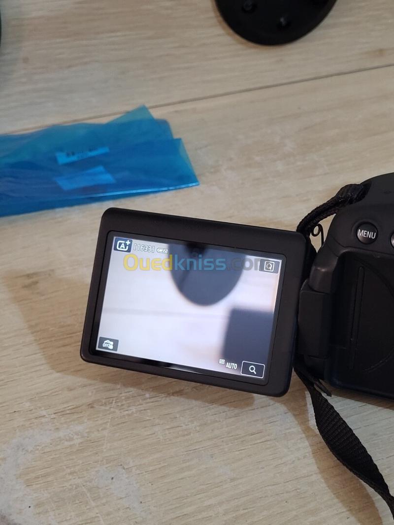 Canon EOS 700D Appareil photo Reflex SLR 18 MP CMOS 5184 x 3456 pixels + Objectif Canon EF-S 18-55mm f/3.5-5.6 IS STM f/3.5-5.6 26
